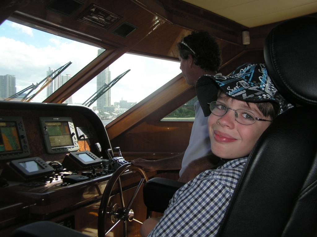 Bradley in the helm chair next to the skipper Mike Griffiths © Stephen Milne